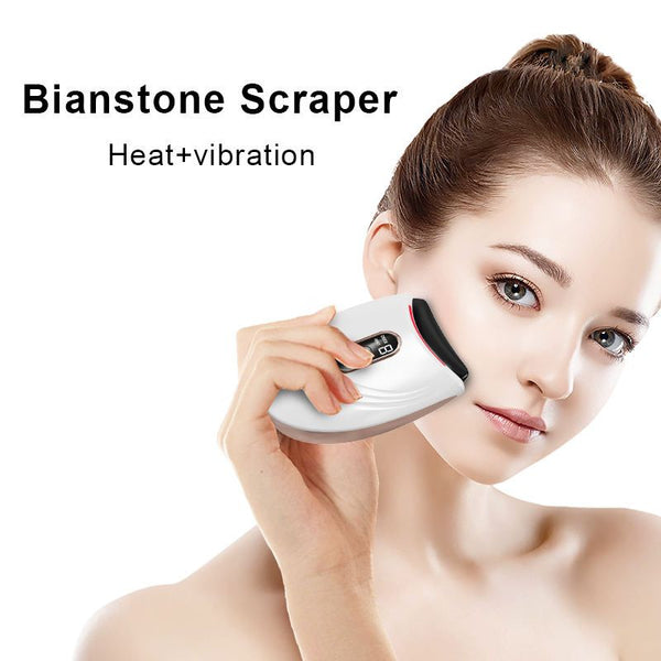 Woman using a Bianstone Scraper with heat and vibration.
