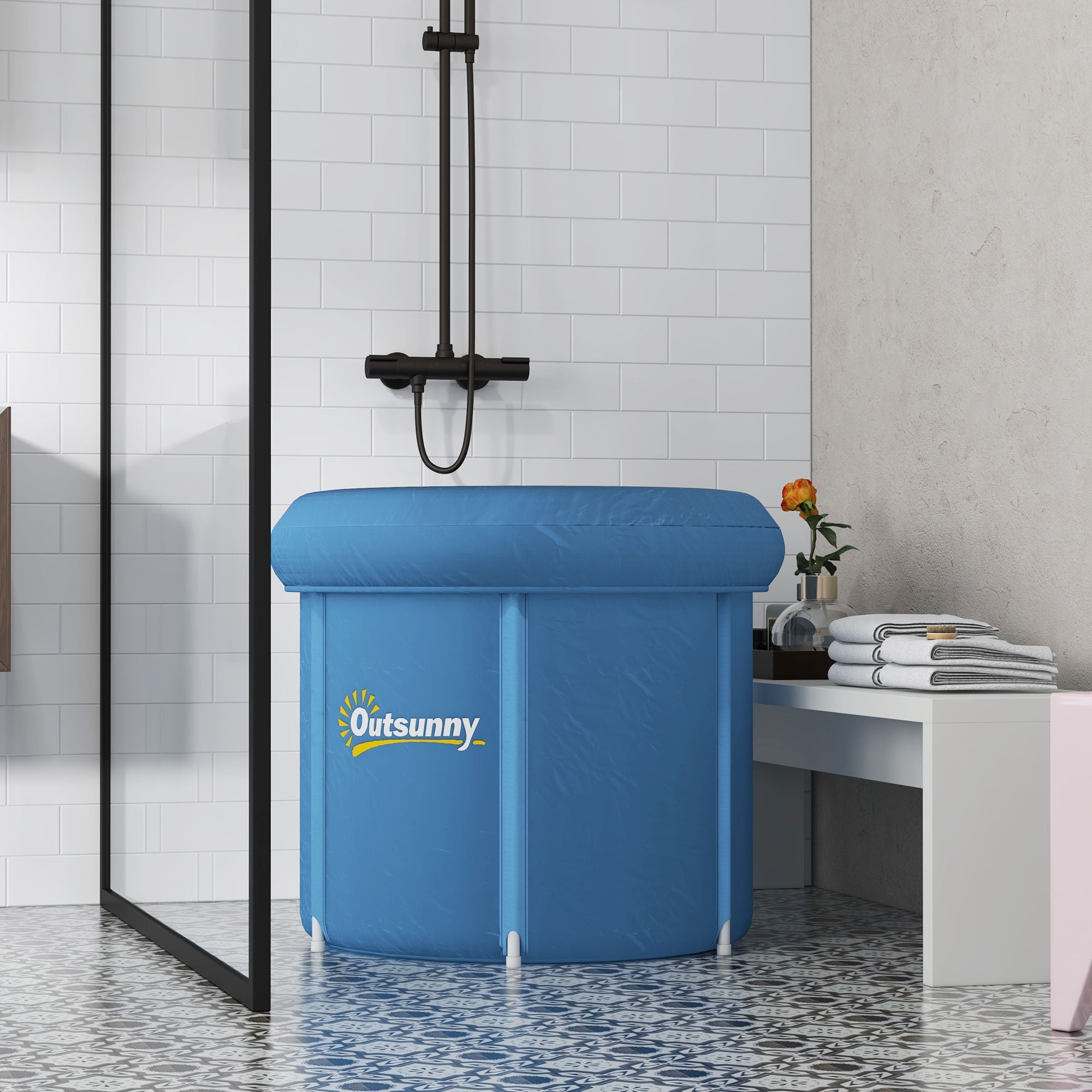 Blue inflatable bathtub with 'Outsunny' branding.