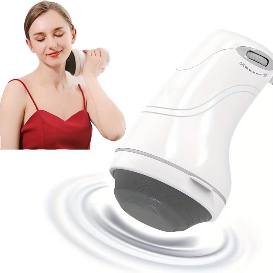 Woman using a white handheld massager on her shoulder.