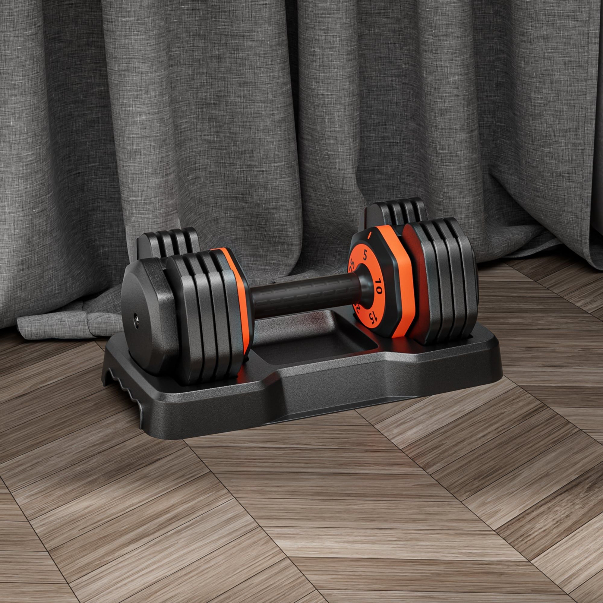 Pair of adjustable dumbbells in black and orange color.