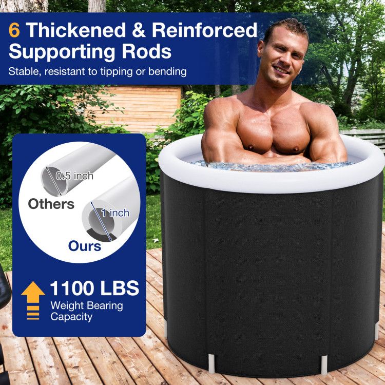 Man in a black inflatable hot tub with reinforced supporting rods.