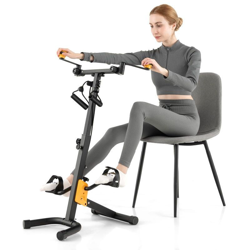 Woman using a home exercise bike attached to a chair.