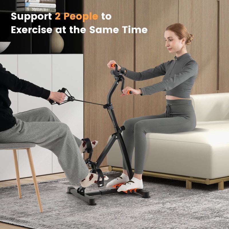 Two people exercising on a home fitness bike.