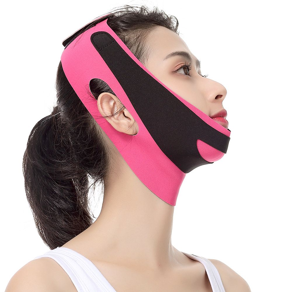 a pink and black headband.