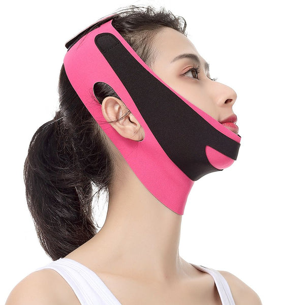 a pink and black headband.