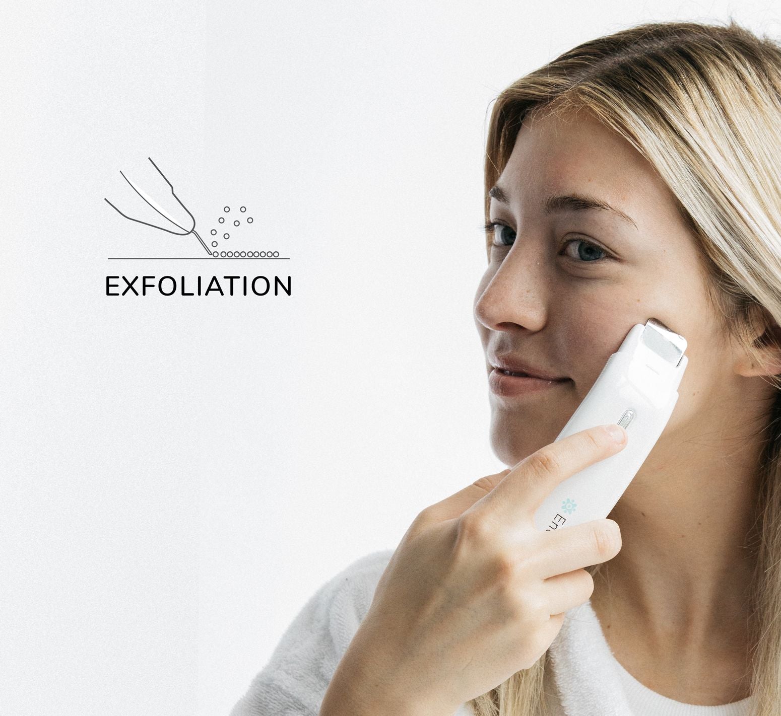 Woman using a 'Exfoliation' skin care device.